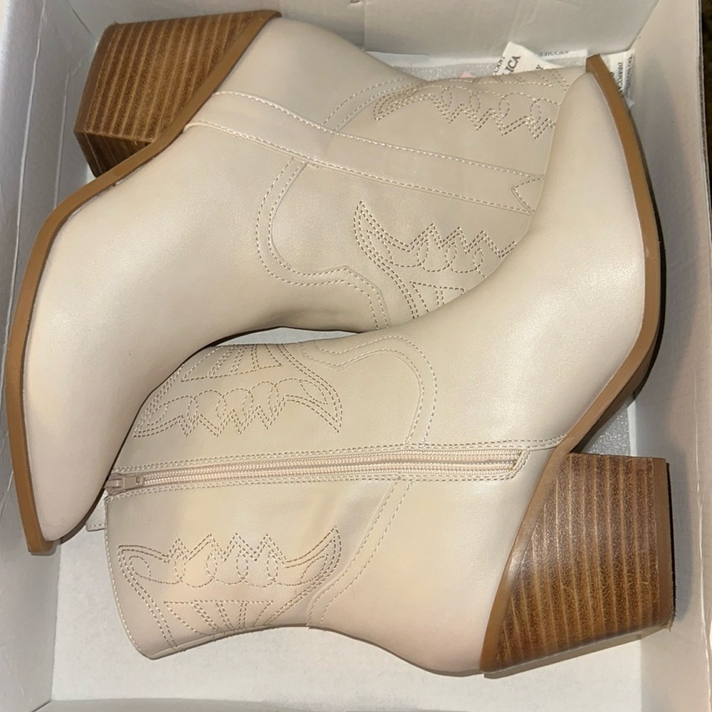 Corky’s white boots
